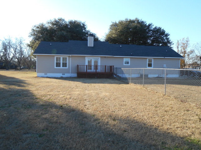 734 Joe Barnes Road Byron, GA 31008 - Photo 3 of 24 a view of a house with a yard
