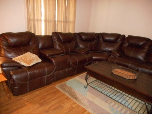 734 Joe Barnes Road Byron, GA 31008 - Photo 22 of 24 a living room with furniture and a couch