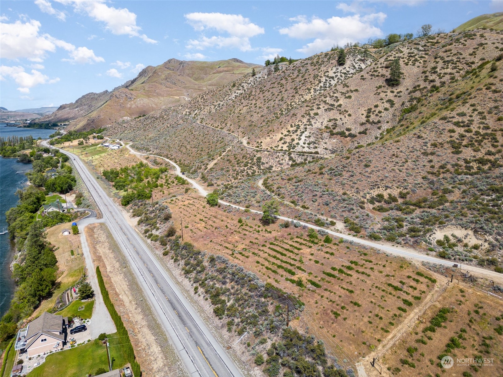 X Riverview Road Orondo, WA 98843 - Photo 4 of 11 a view of balcony with wooden floor