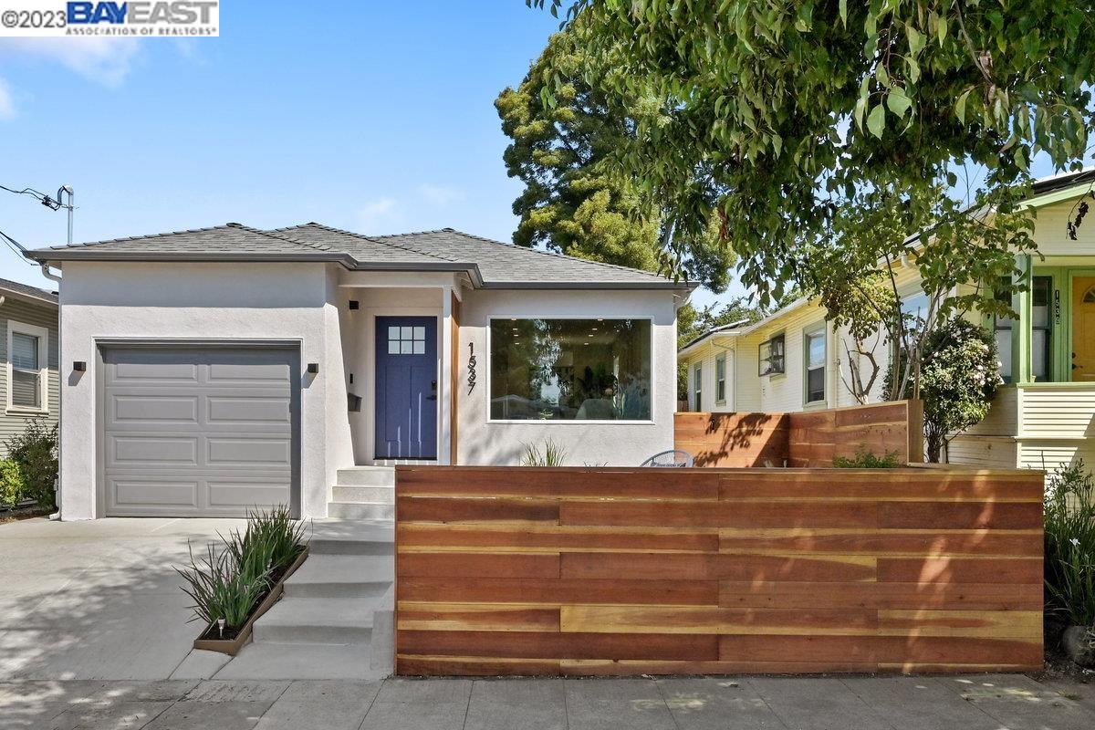 1537 Carleton Street Berkeley, CA 94703 - Photo 1 of 1 a front view of a house with garden