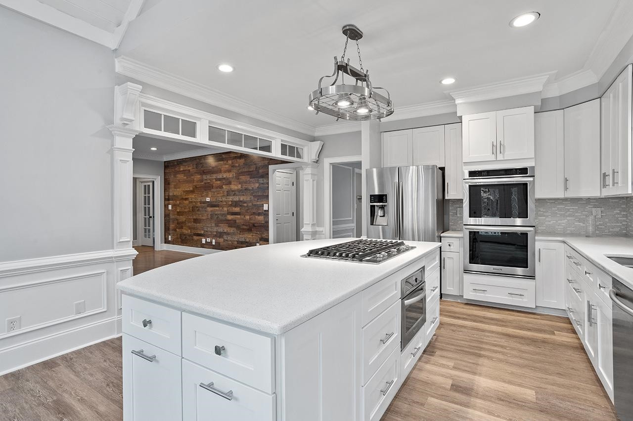 9132 Sutherland Court Raleigh, NC 27615 - Photo 9 of 36 Kitchen island