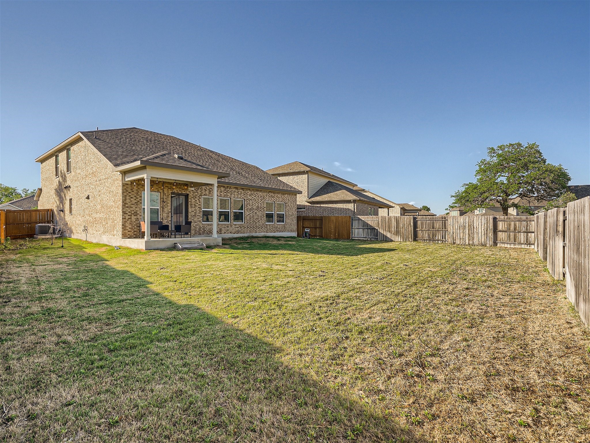 1416 Deering Run Leander, TX 78641 - Photo 21 of 21 a front view of a house with garden