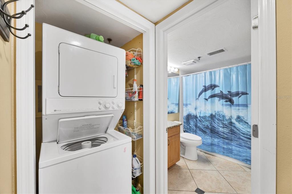 11000 Placida Road, Unit 1601 Placida, FL 33946 - Photo 26 of 58 a bathroom with a toilet and a shower