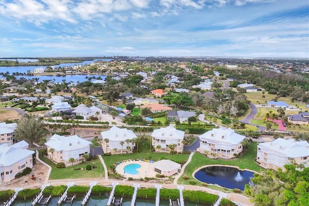 11000 Placida Road, Unit 1601 Placida, FL 33946 - Photo 29 of 58 an aerial view of residential houses with outdoor space