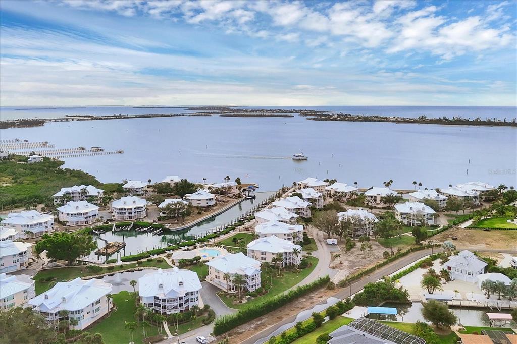 11000 Placida Road, Unit 1601 Placida, FL 33946 - Photo 32 of 58 an aerial view of multiple house