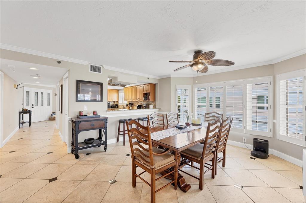 11000 Placida Road, Unit 1601 Placida, FL 33946 - Photo 7 of 58 a view of a dining room with furniture and a livingroom