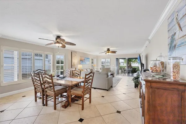a large kitchen with a stove a sink dishwasher and cabinets