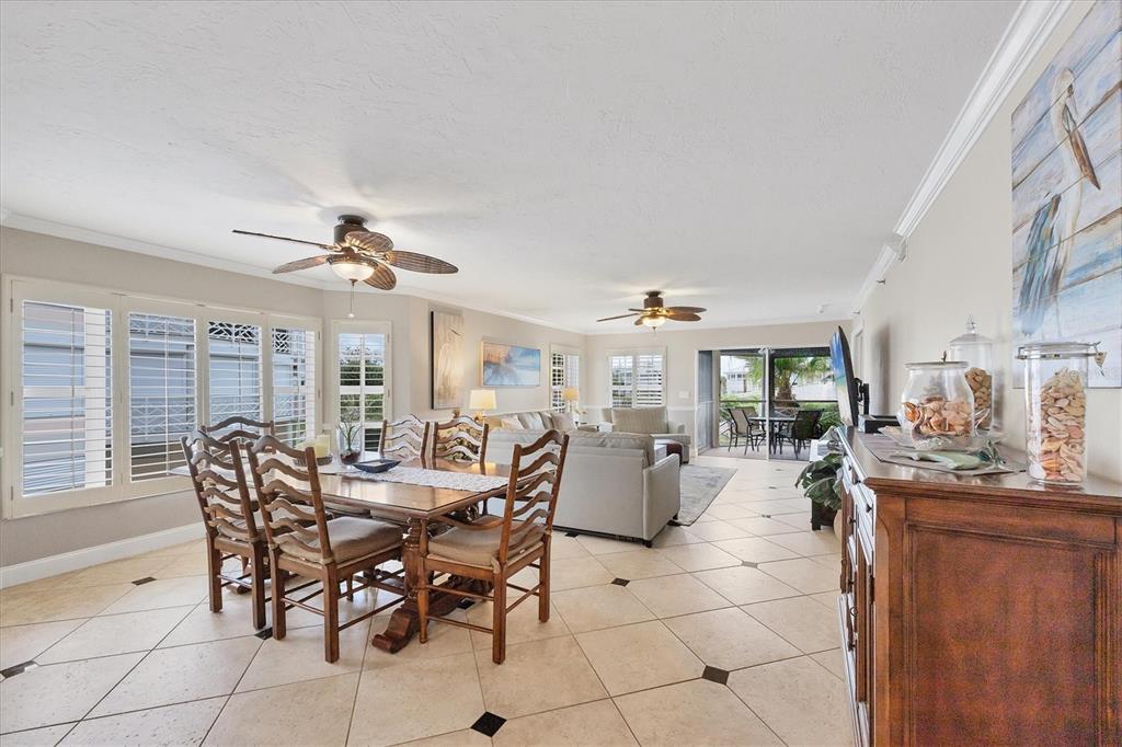 11000 Placida Road, Unit 1601 Placida, FL 33946 - Photo 8 of 58 a view of a dining room with furniture window and outside view