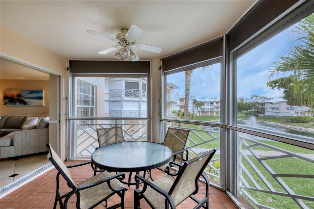 11000 Placida Road, Unit 1601 Placida, FL 33946 - Photo 10 of 58 a view of a dining room with furniture window and outside view