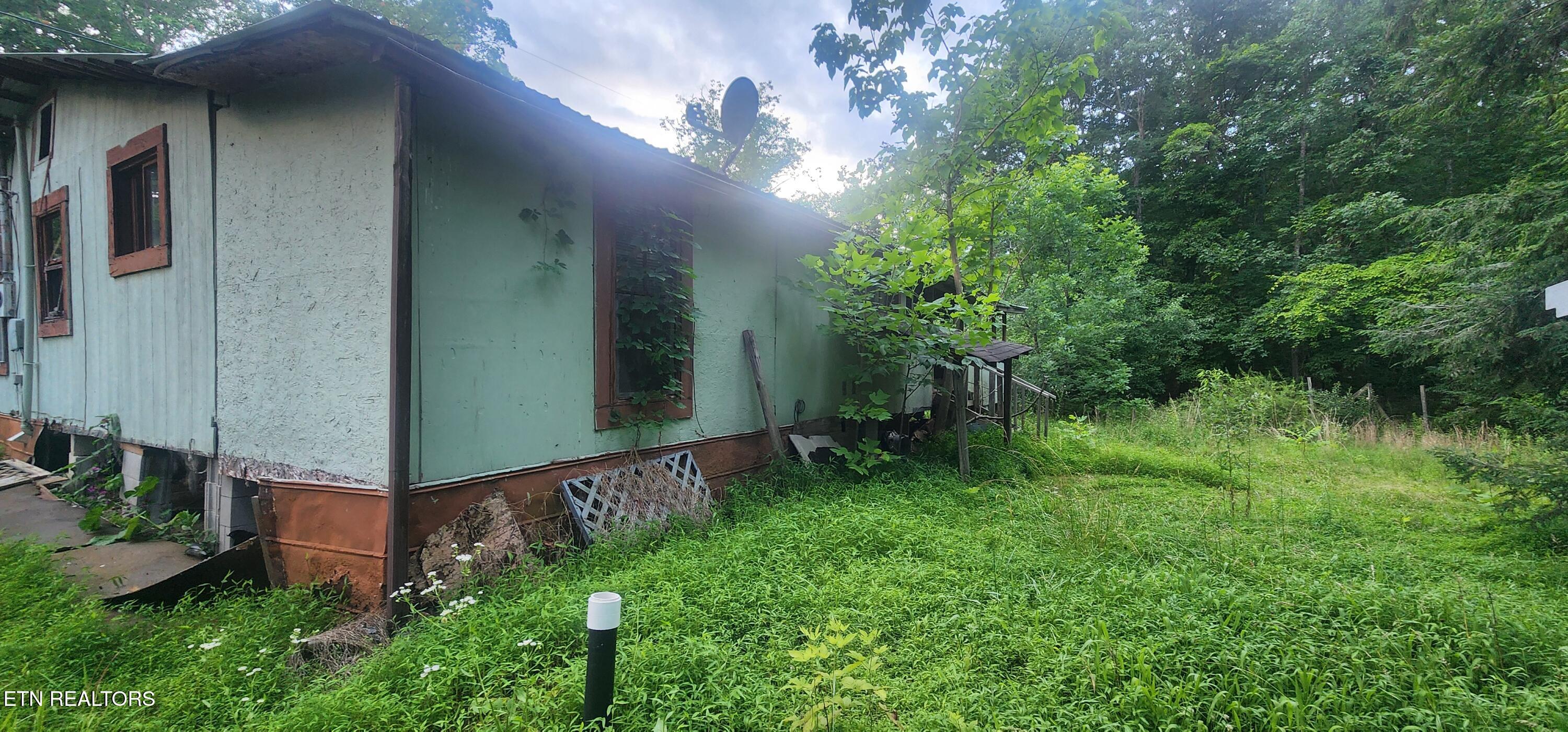 229 Obis Bowling Road Robbins, TN 37852 - Photo 4 of 26 20250619_202238