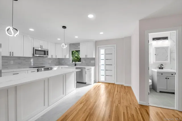 a large kitchen with a lot of counter space