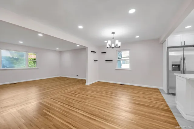 a view of an empty room and window