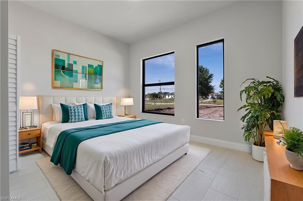 4173 58th Avenue Northeast Naples, FL 34120 - Photo 6 of 15 Bedroom with baseboards