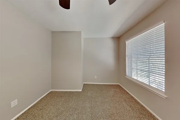 a view of an empty room with window