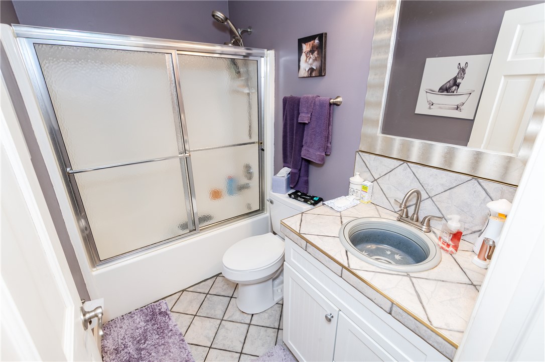 159 East Lytle 5 Points Road Springboro, OH 45066 - Photo 20 of 45 This bathroom features a sleek vanity and a combination shower-tub.