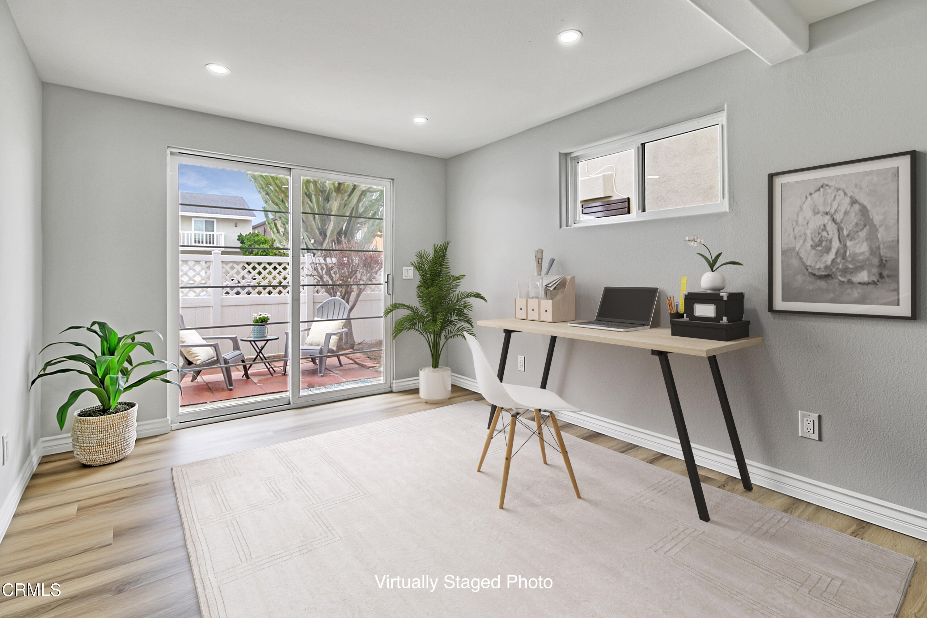 1516 Ocean Drive Oxnard, CA 93035 - Photo 32 of 42 a living room with furniture and a potted plant