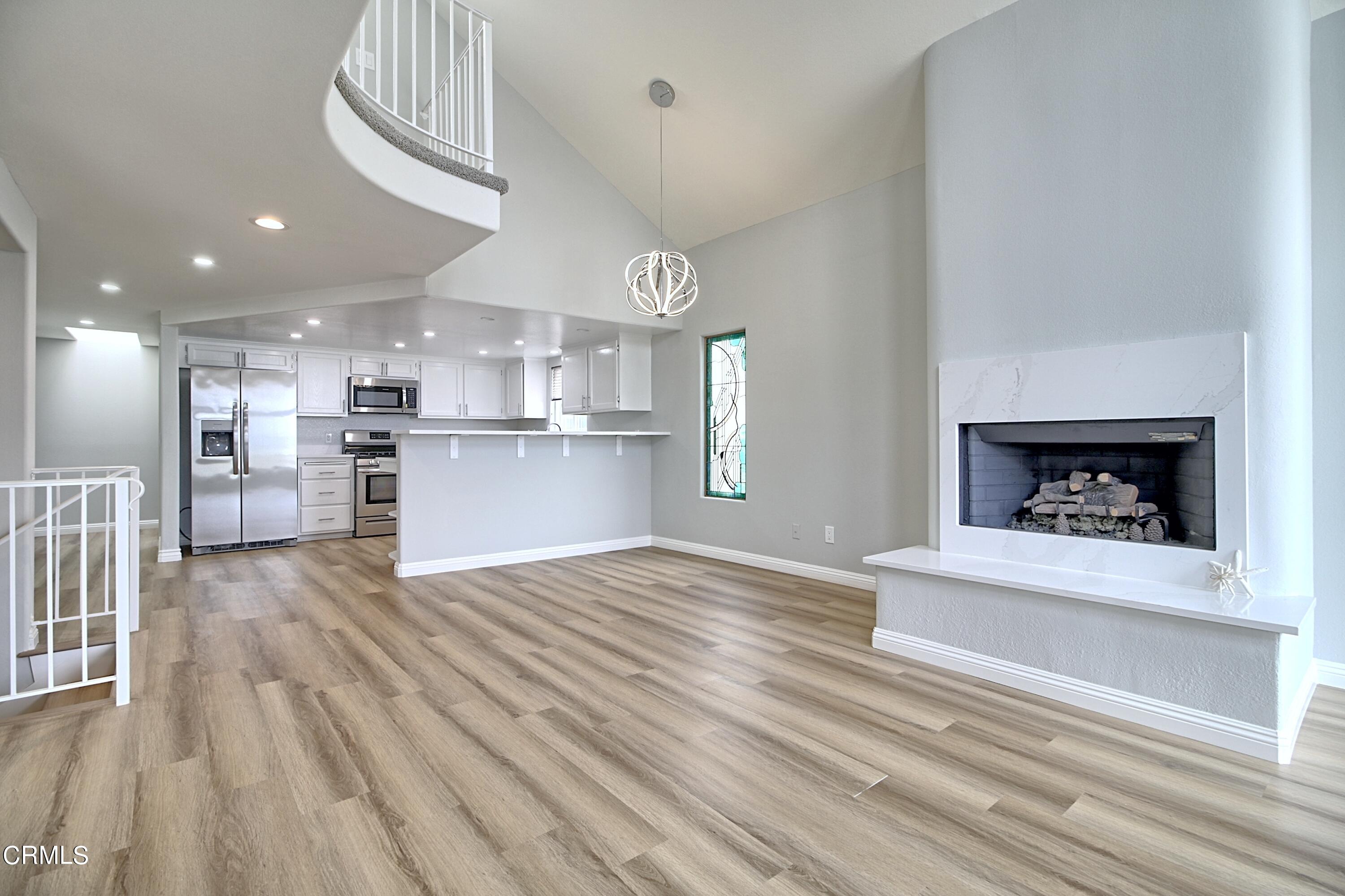 1516 Ocean Drive Oxnard, CA 93035 - Photo 7 of 42 a view of kitchen with cabinets and wooden floor
