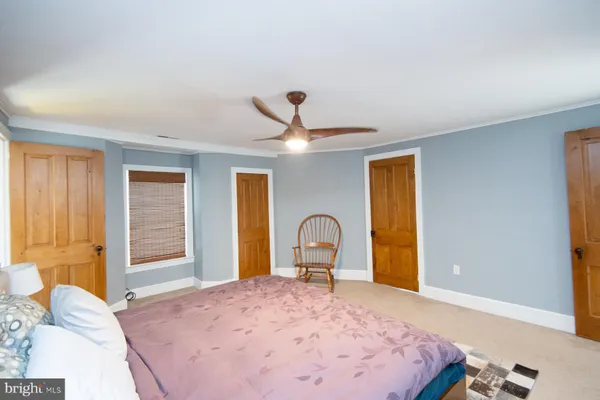 a view of a living room with a large window