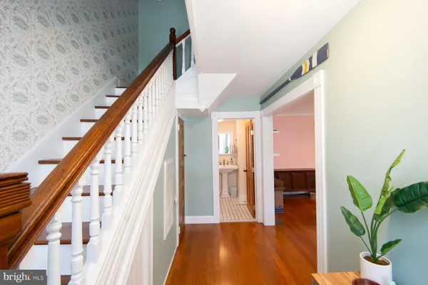 a view of front door and wooden floor