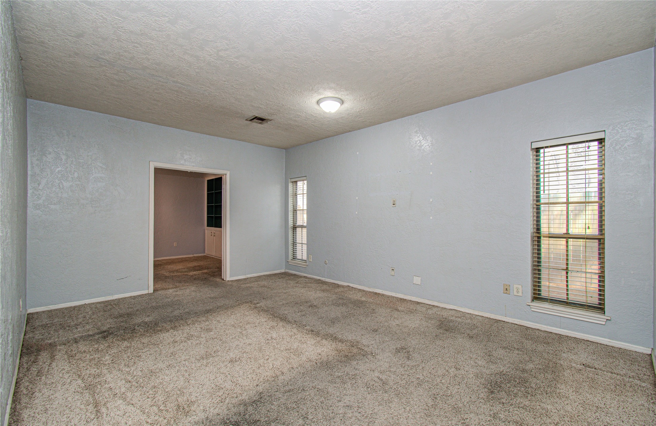 8103 Oak Moss Drive Spring, TX 77379 - Photo 27 of 33 a view of an empty room with a window