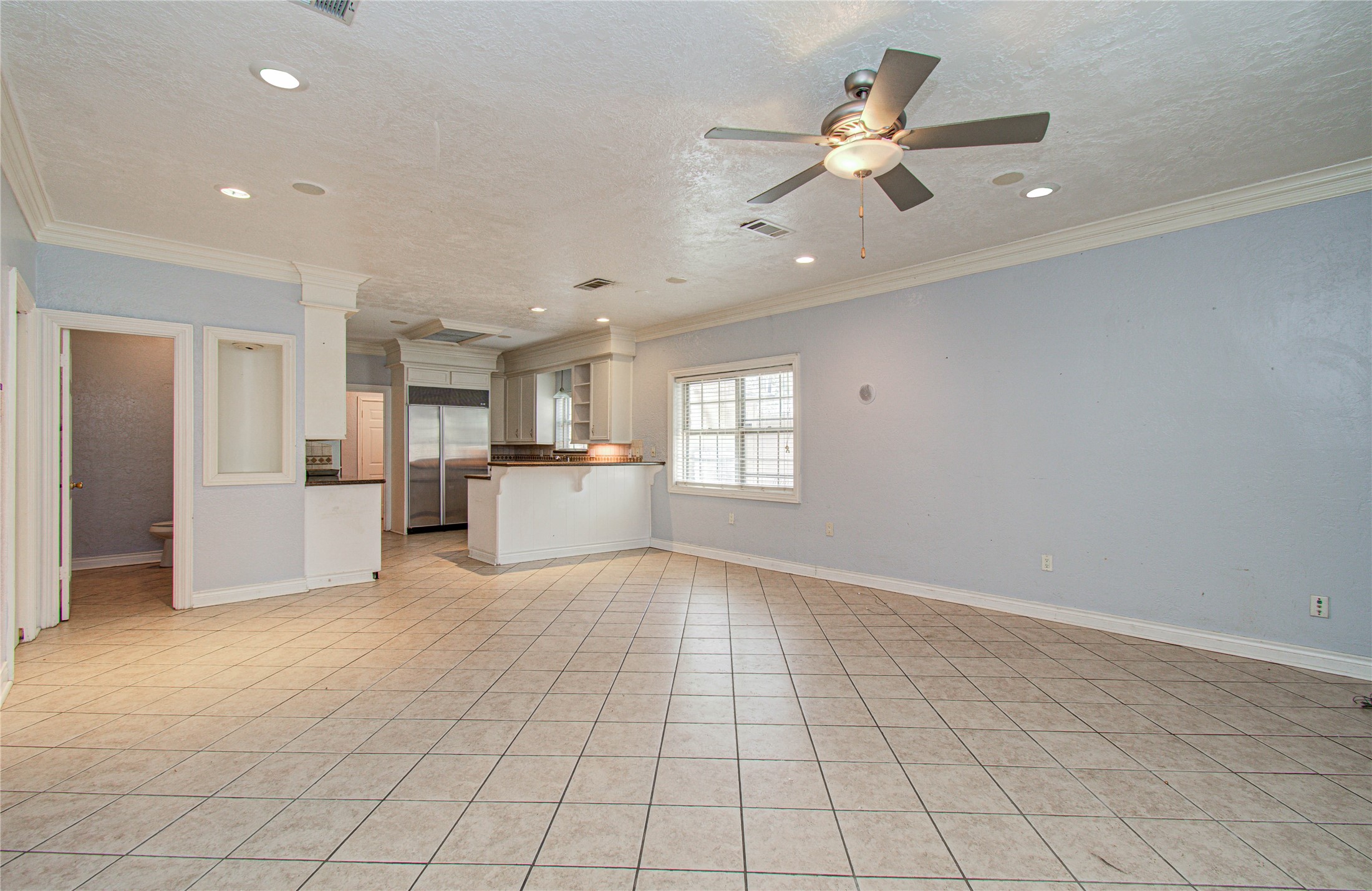 8103 Oak Moss Drive Spring, TX 77379 - Photo 9 of 33 a view of a kitchen with a sink and a window