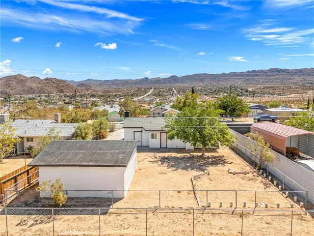 a view of a terrace with a city view