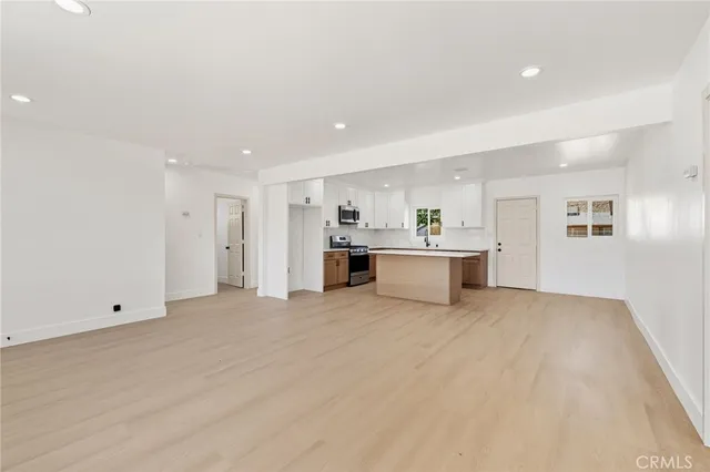 a view of a kitchen with a sink