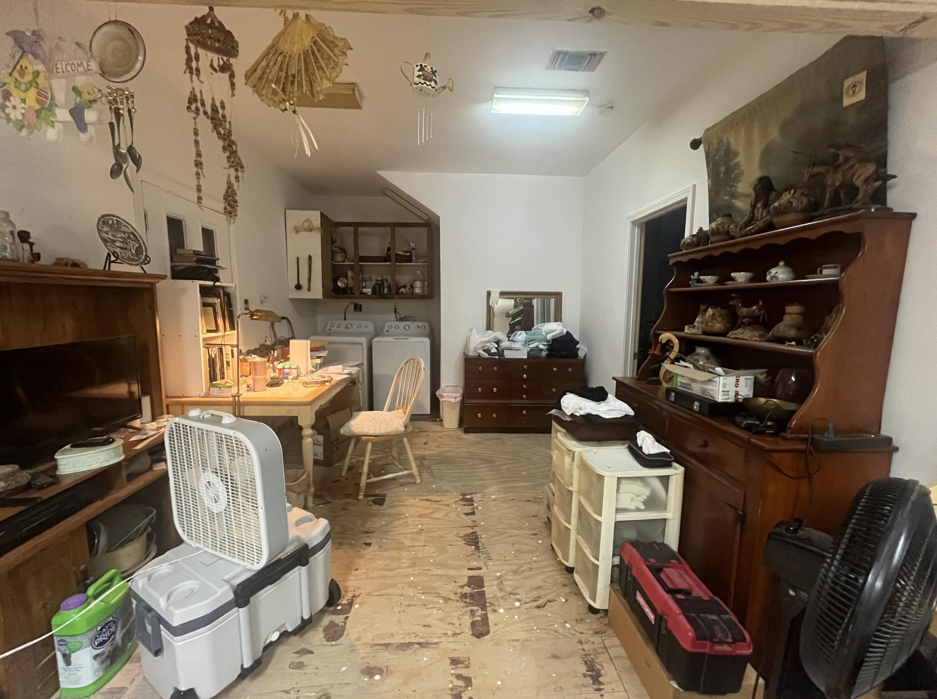 58 Hankins Road Freeport, FL 32439 - Photo 11 of 29 a living room with furniture a rug and a fireplace