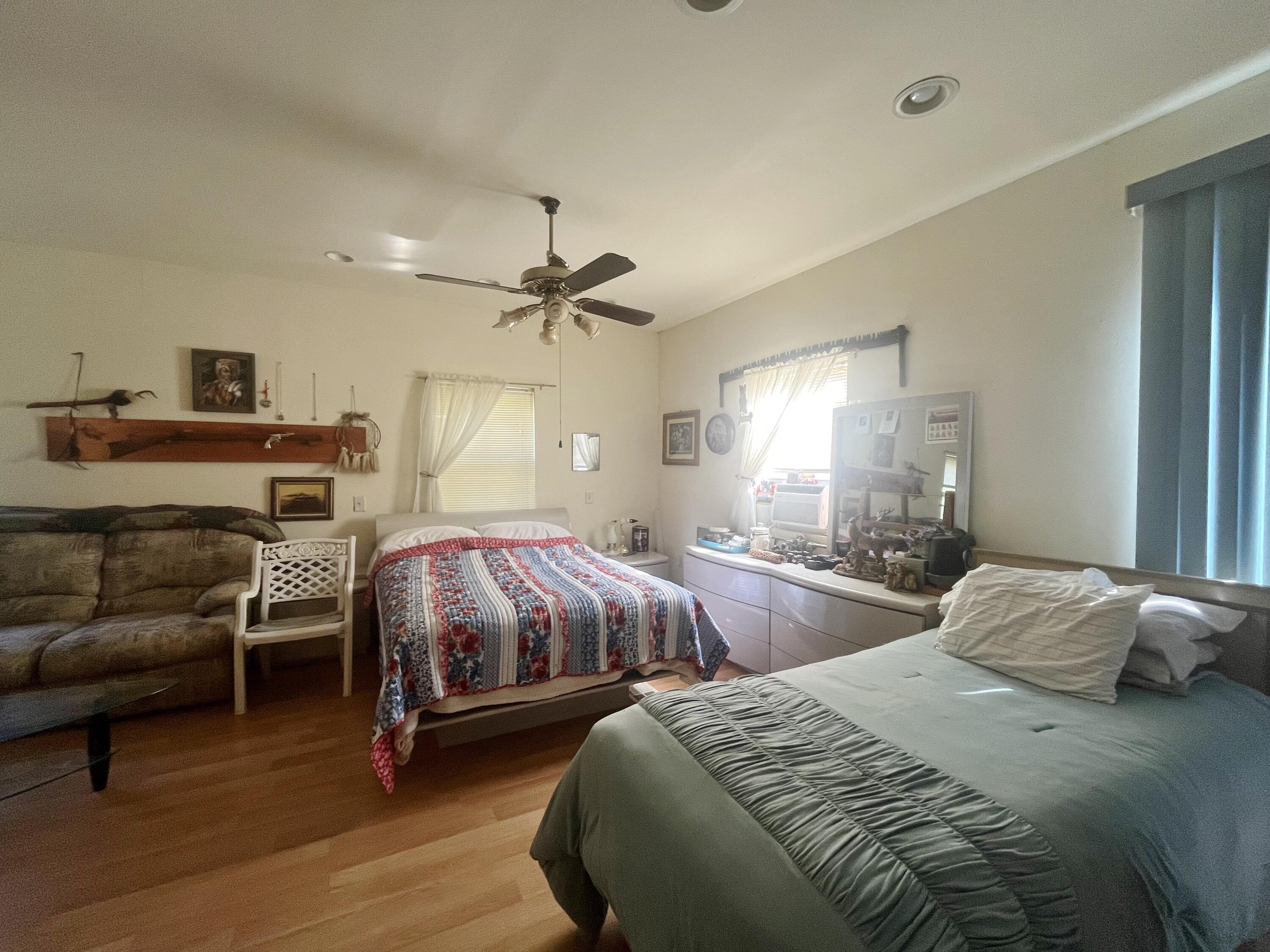 58 Hankins Road Freeport, FL 32439 - Photo 16 of 29 a bedroom with two beds and furniture