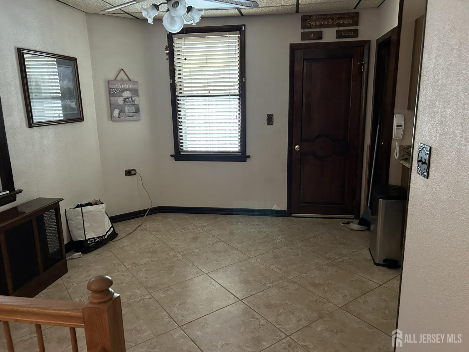 73 Edgar Street Carteret, NJ 07008 - Photo 2 of 5 a view of an empty room with a window