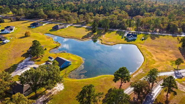 an aerial view of residential house with outdoor space