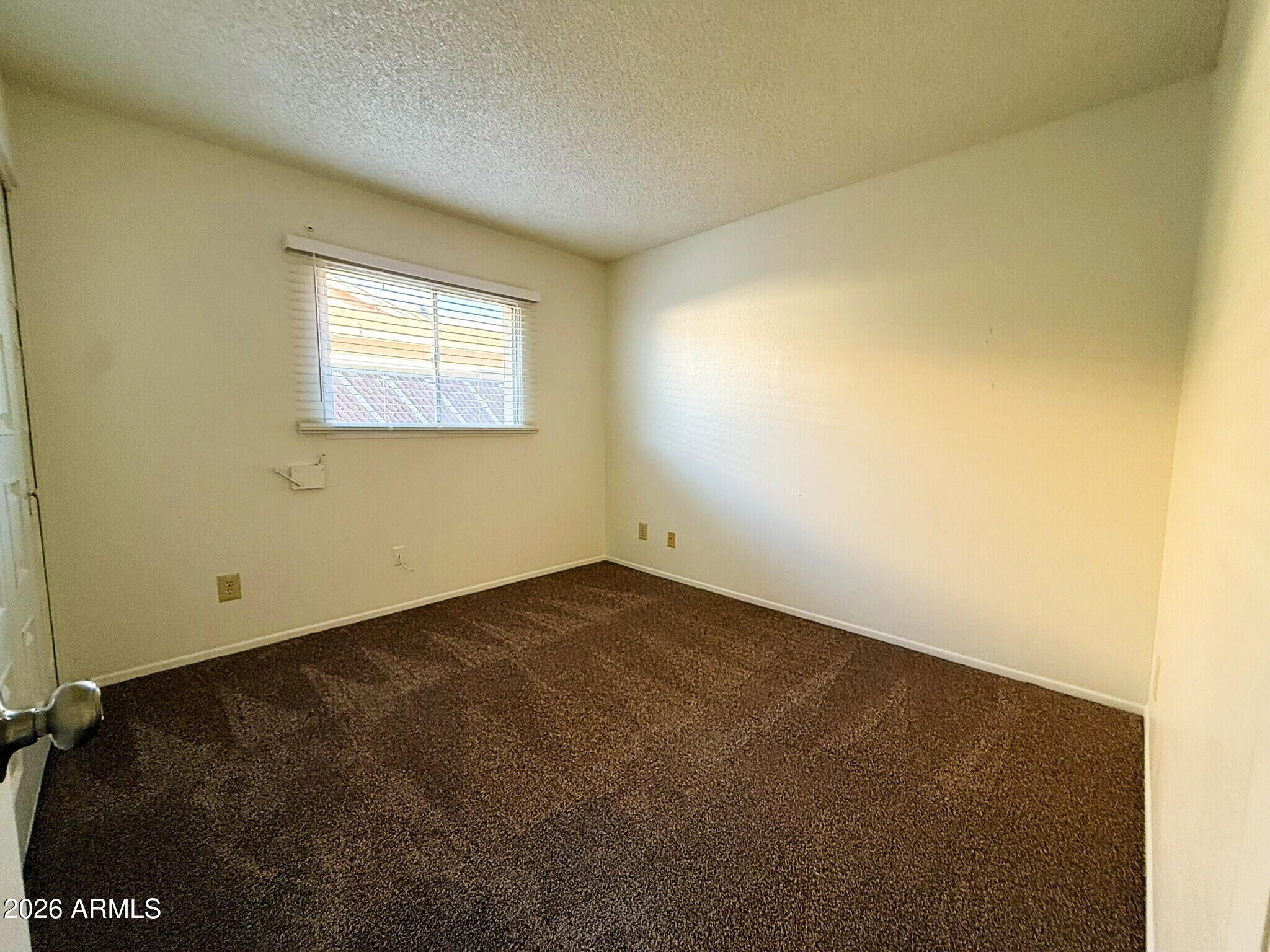 5208 West Calavar Road Glendale, AZ 85306 - Photo 17 of 39 an empty room with a empty space