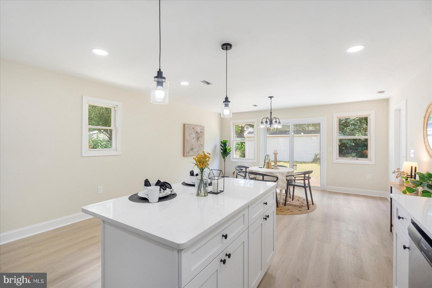 8111 Holly Road Curtis Bay, MD 21226 - Photo 17 of 46 a very nice looking dining room with a table and chairs