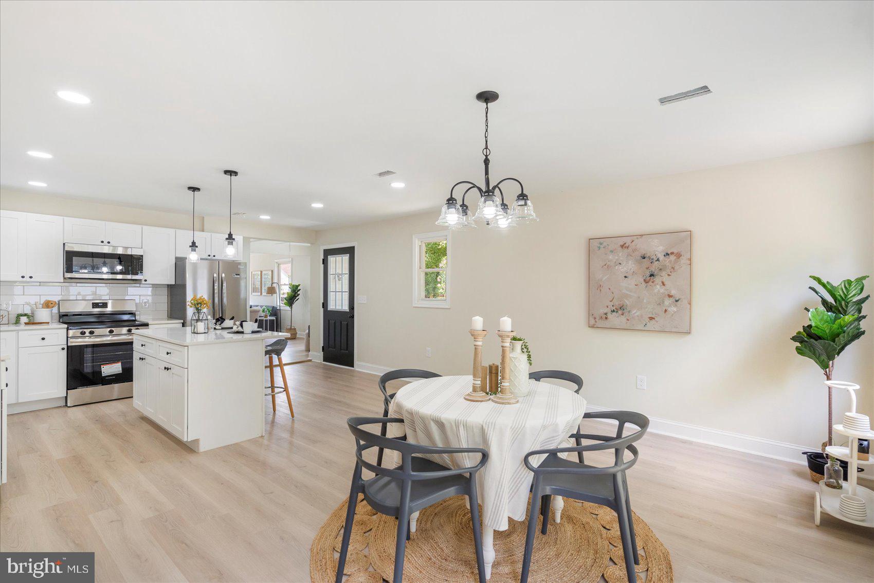 8111 Holly Road Curtis Bay, MD 21226 - Photo 22 of 46 a view of a dining room with furniture
