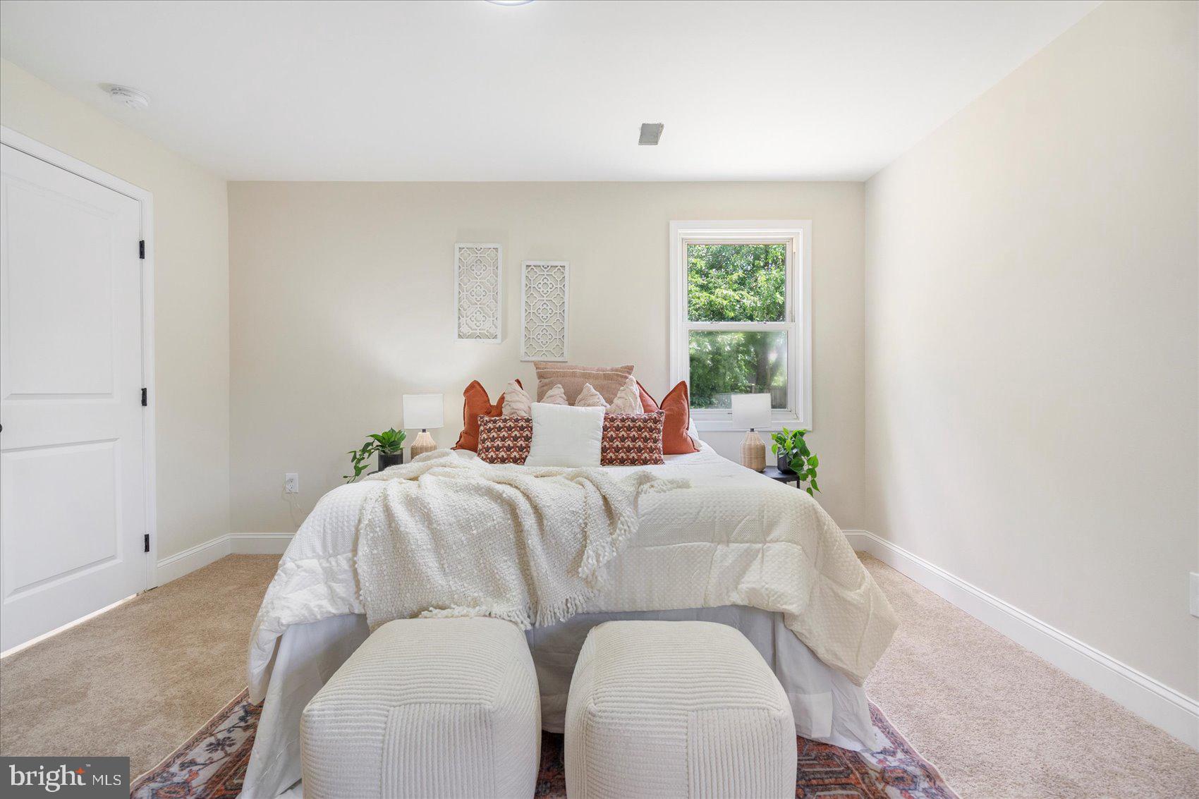 8111 Holly Road Curtis Bay, MD 21226 - Photo 24 of 46 a bed room with a bed and a window