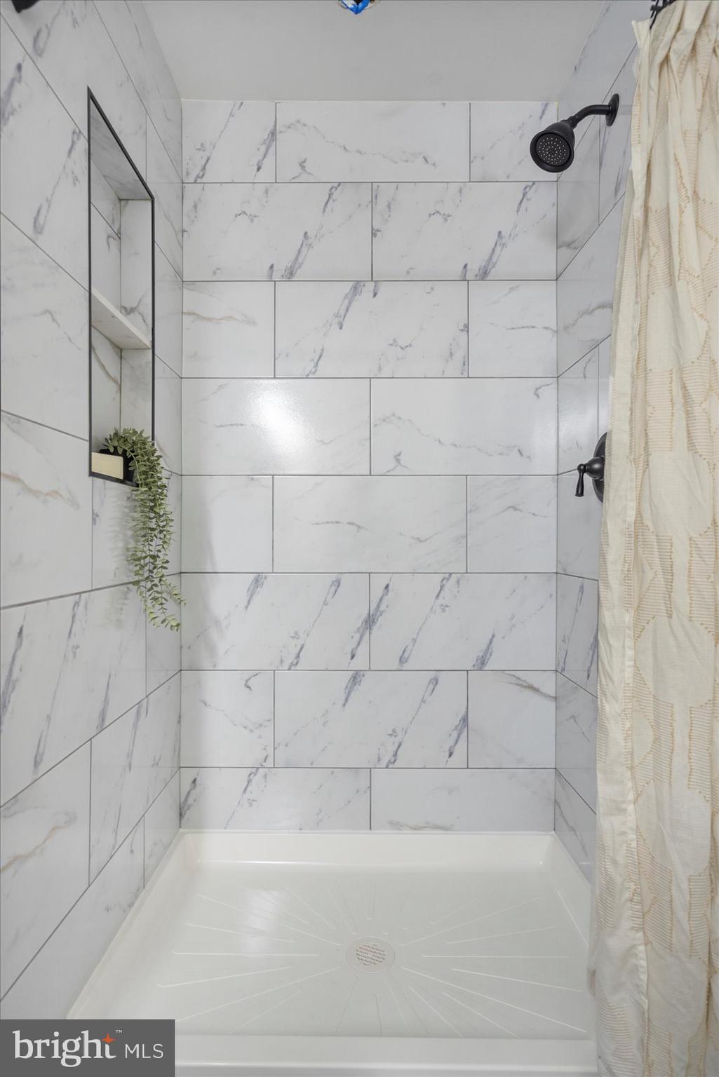 8111 Holly Road Curtis Bay, MD 21226 - Photo 28 of 46 a bathroom with a shower