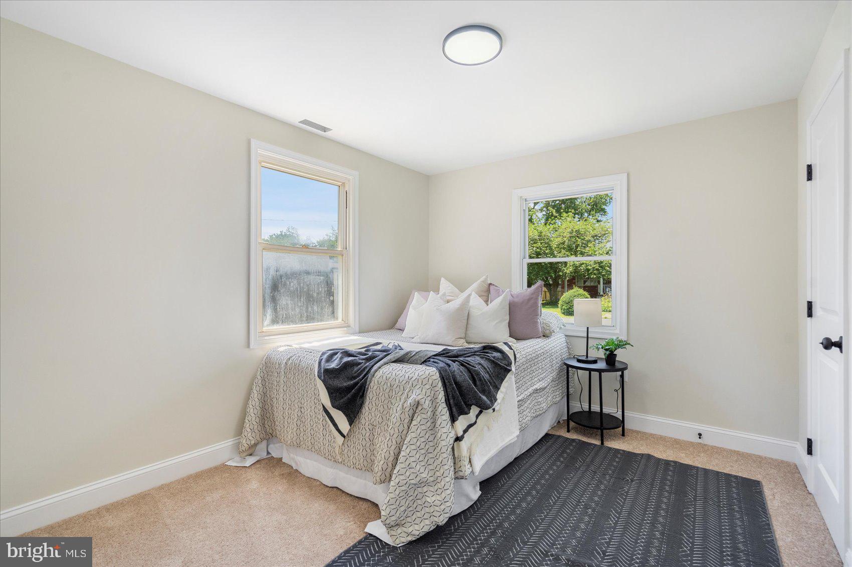 8111 Holly Road Curtis Bay, MD 21226 - Photo 34 of 46 a bed room with a bed and a window