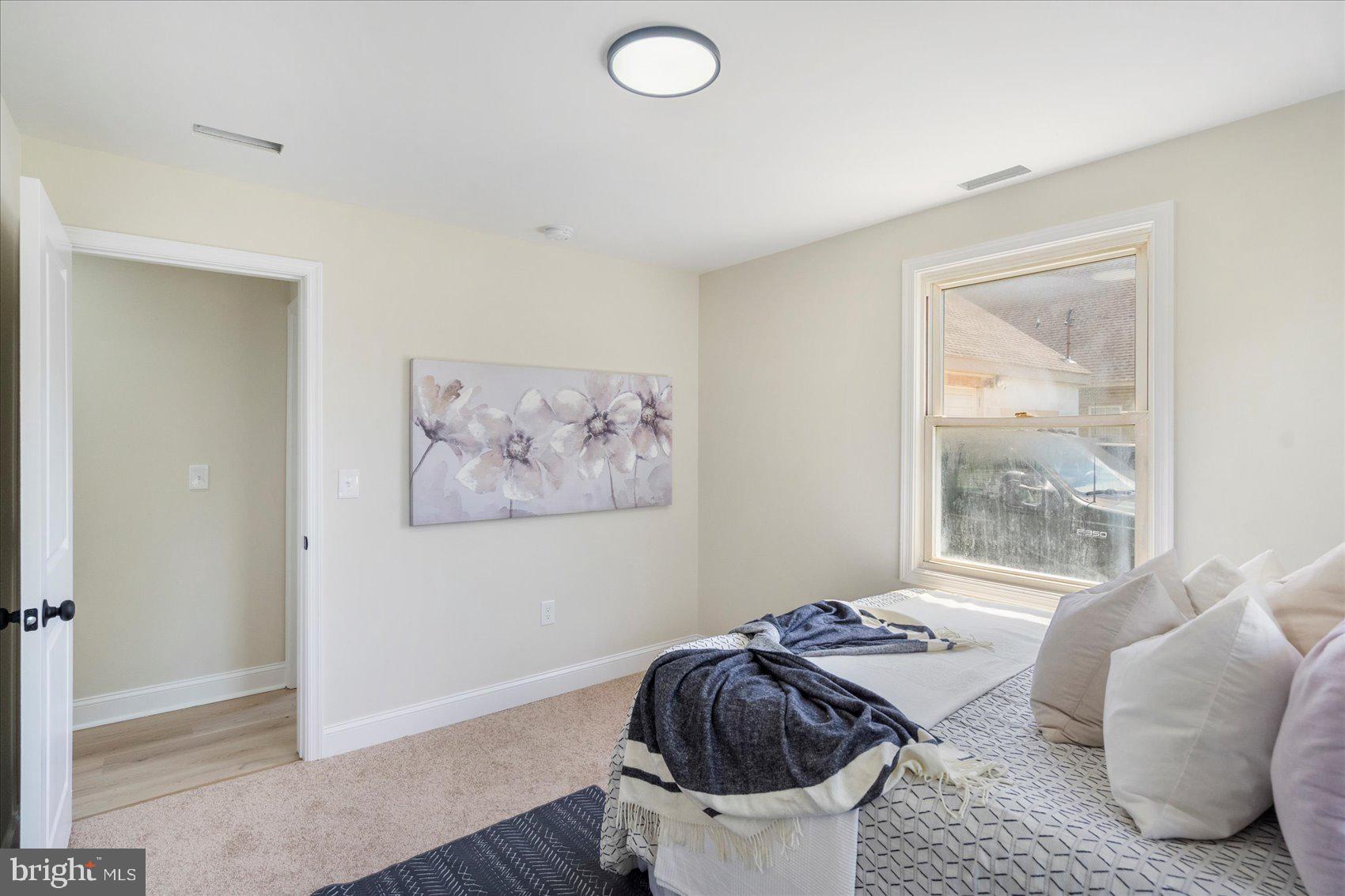 8111 Holly Road Curtis Bay, MD 21226 - Photo 35 of 46 a living room with furniture and a window