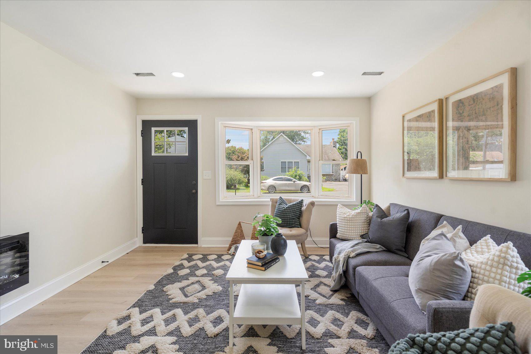 8111 Holly Road Curtis Bay, MD 21226 - Photo 4 of 46 a living room with furniture and a couch