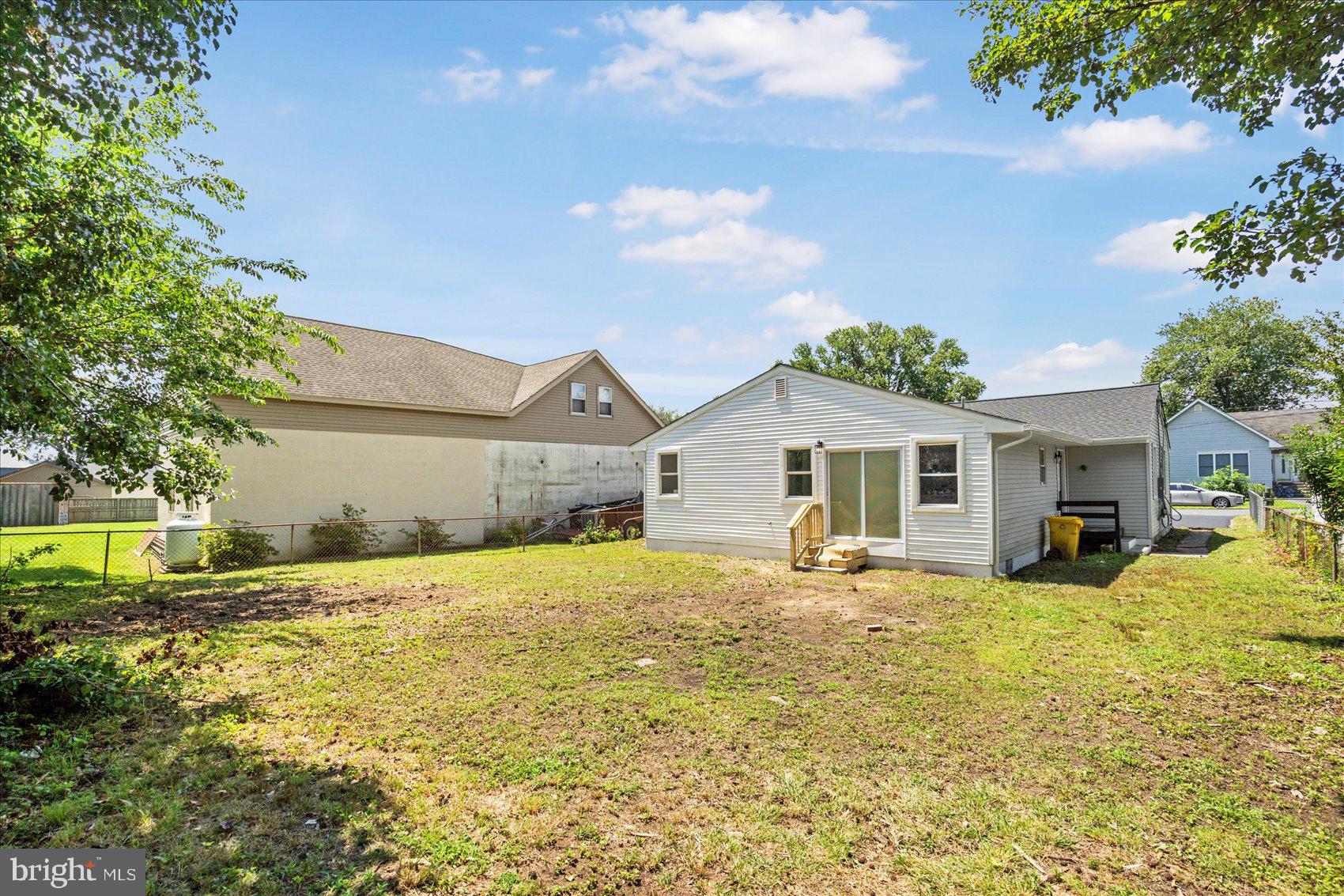 8111 Holly Road Curtis Bay, MD 21226 - Photo 44 of 46 a house view with a sitting space and garden