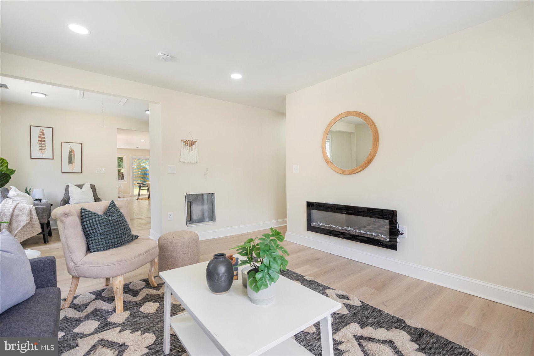 8111 Holly Road Curtis Bay, MD 21226 - Photo 10 of 46 a living room with furniture and wooden floor