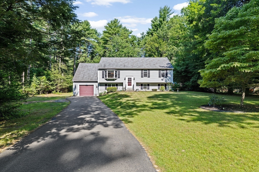 800 Pleasant Street Hanson, MA 02341 - Photo 38 of 38 a aerial view of a house with swimming pool next to a big yard