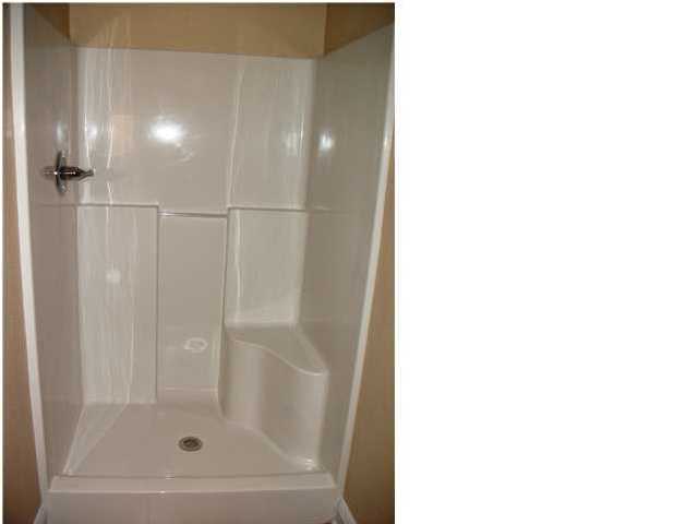 9984 Nichols Lake Road Milton, FL 32583 - Photo 14 of 21 a bathroom with a shower