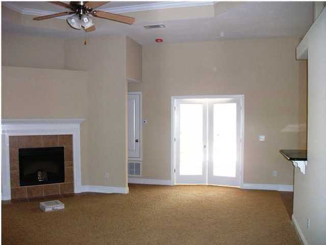 9984 Nichols Lake Road Milton, FL 32583 - Photo 5 of 21 a view of an empty room with a fireplace