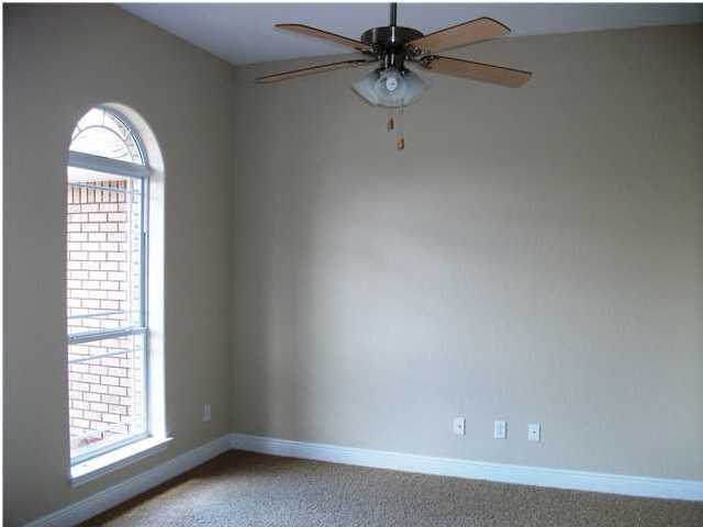 9984 Nichols Lake Road Milton, FL 32583 - Photo 10 of 21 an empty room with a window