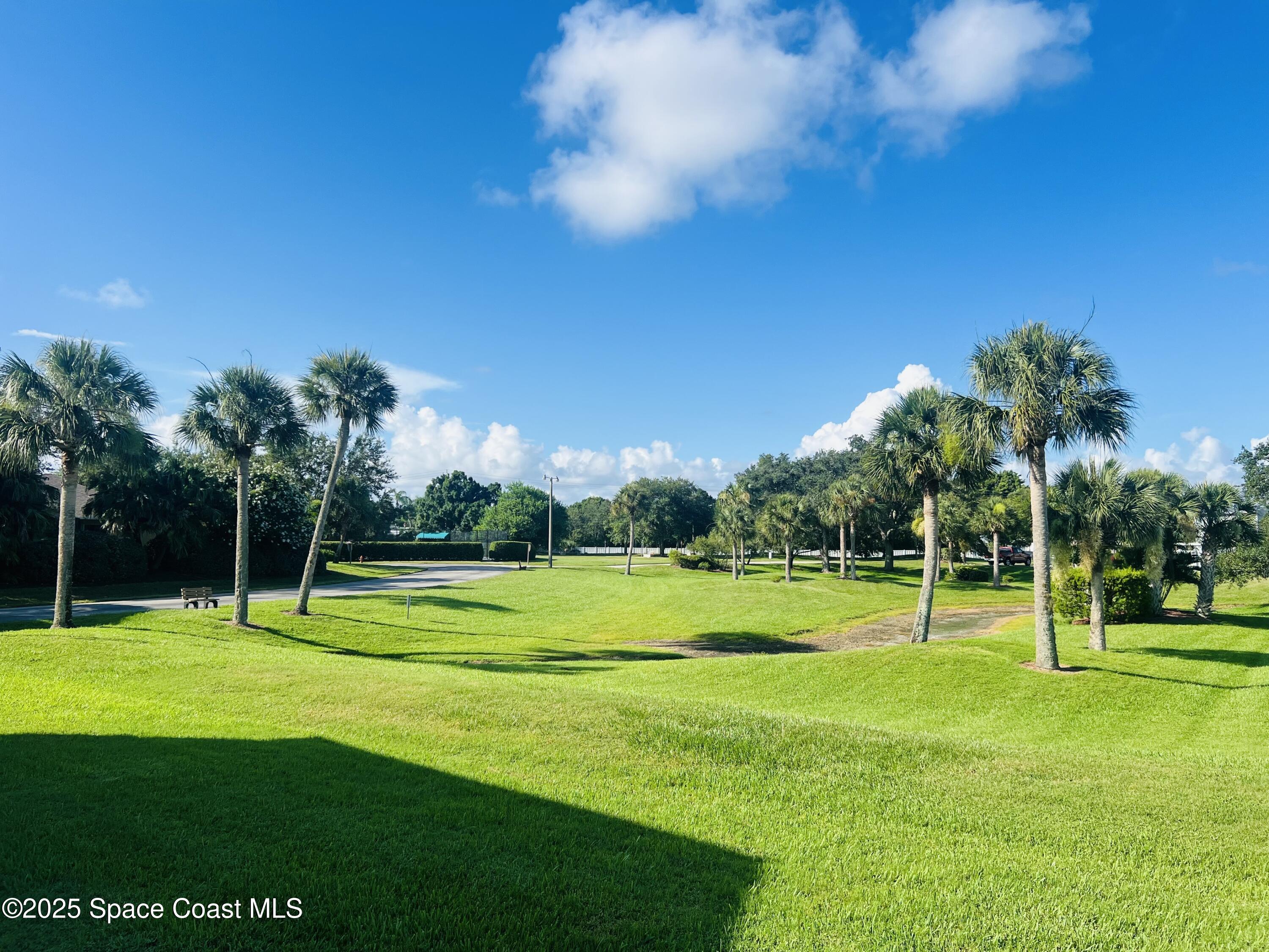 1123 Breezy Way, Unit 8C Sebastian, FL 32958 - Photo 22 of 26 a view of a basketball court
