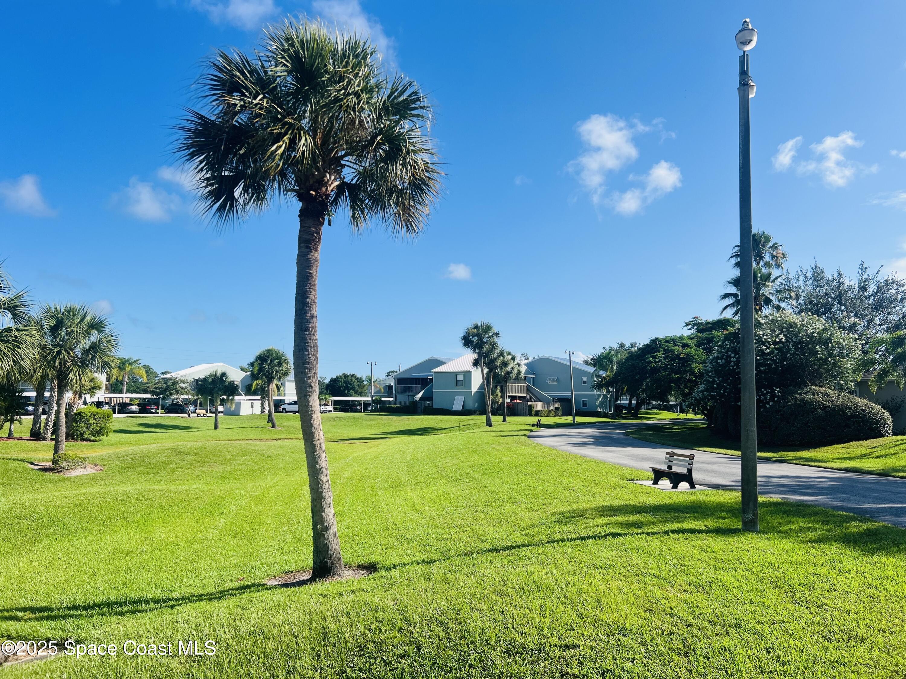 1123 Breezy Way, Unit 8C Sebastian, FL 32958 - Photo 23 of 26 a view of a basketball court