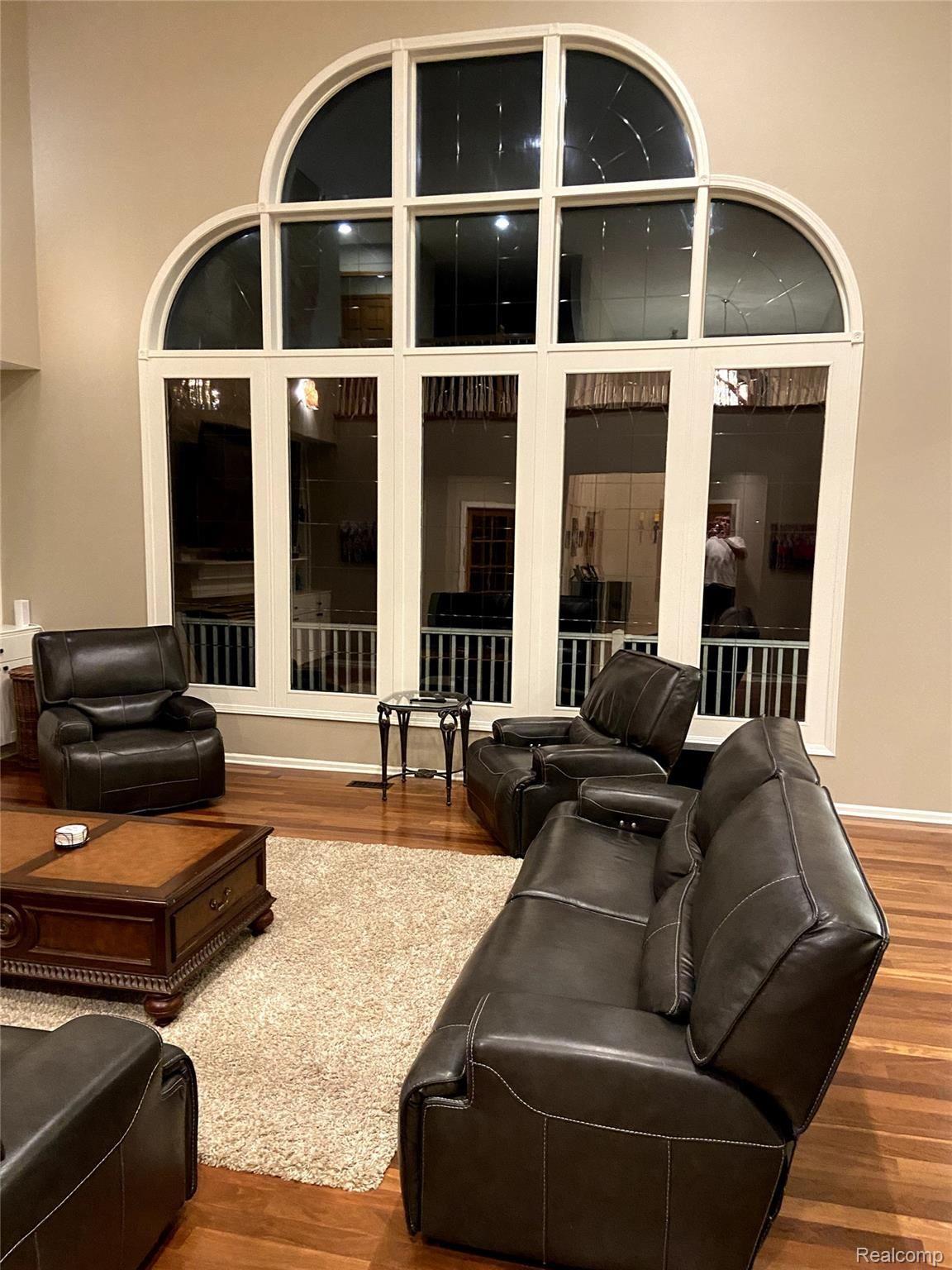 11636 Kings Colony Road Grand Blanc, MI 48439 - Photo 29 of 73 Wall of windows overlooking golf course
