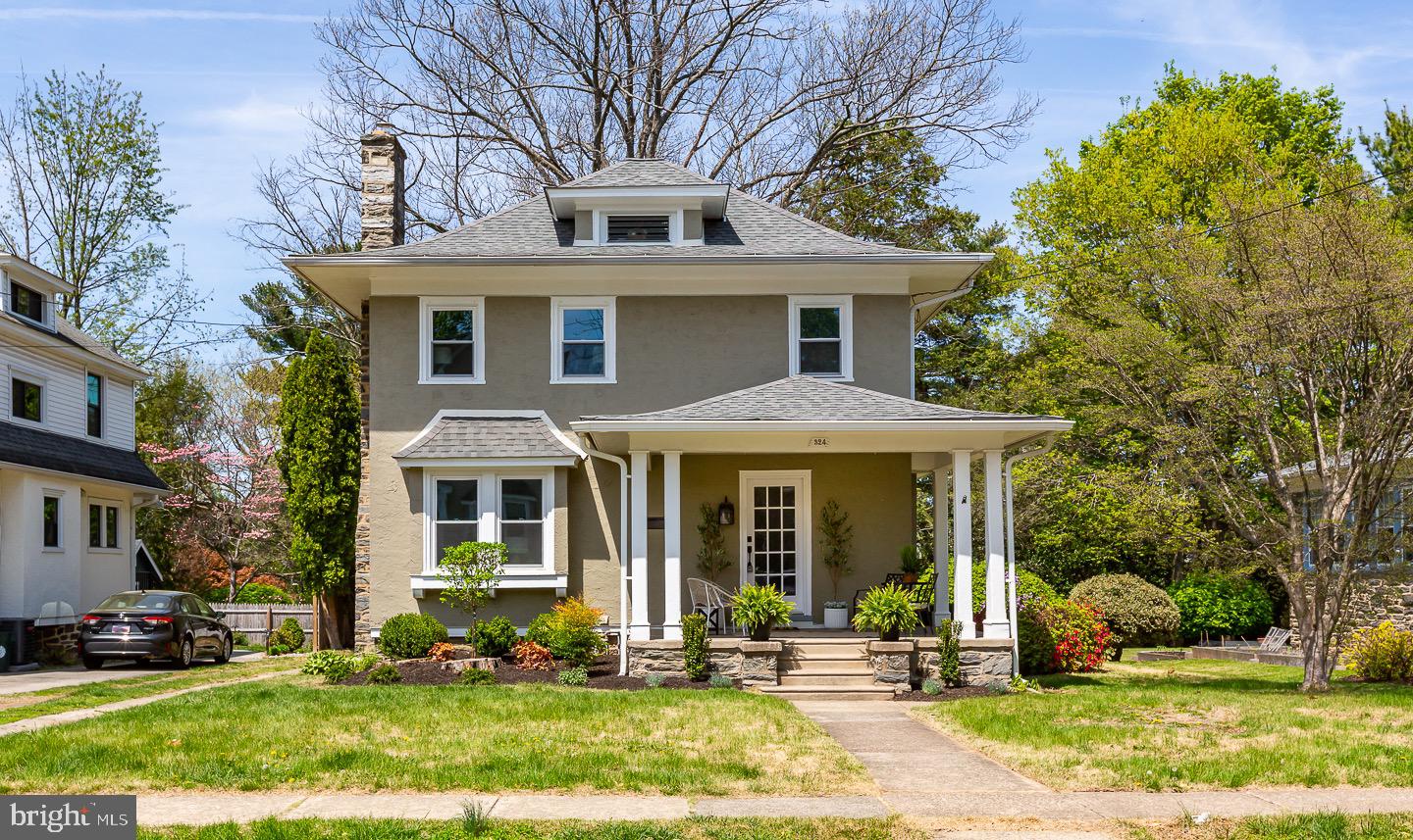 324 Strathmore Road Havertown, PA 19083 - Photo 1 of 53 a front view of a house with a yard