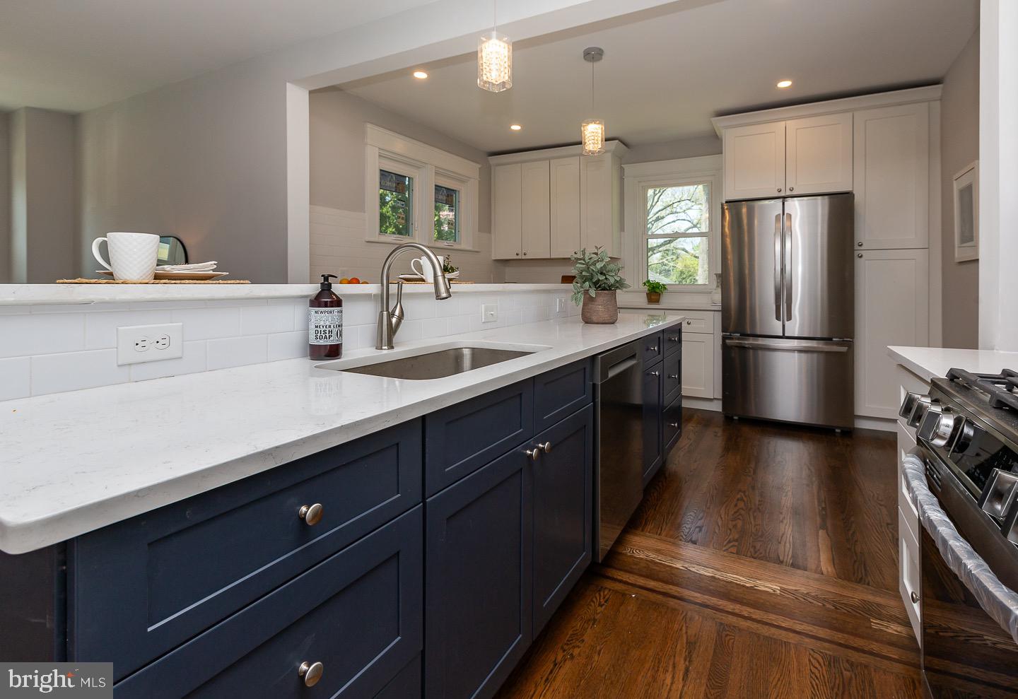 324 Strathmore Road Havertown, PA 19083 - Photo 15 of 53 a kitchen with a refrigerator and a sink